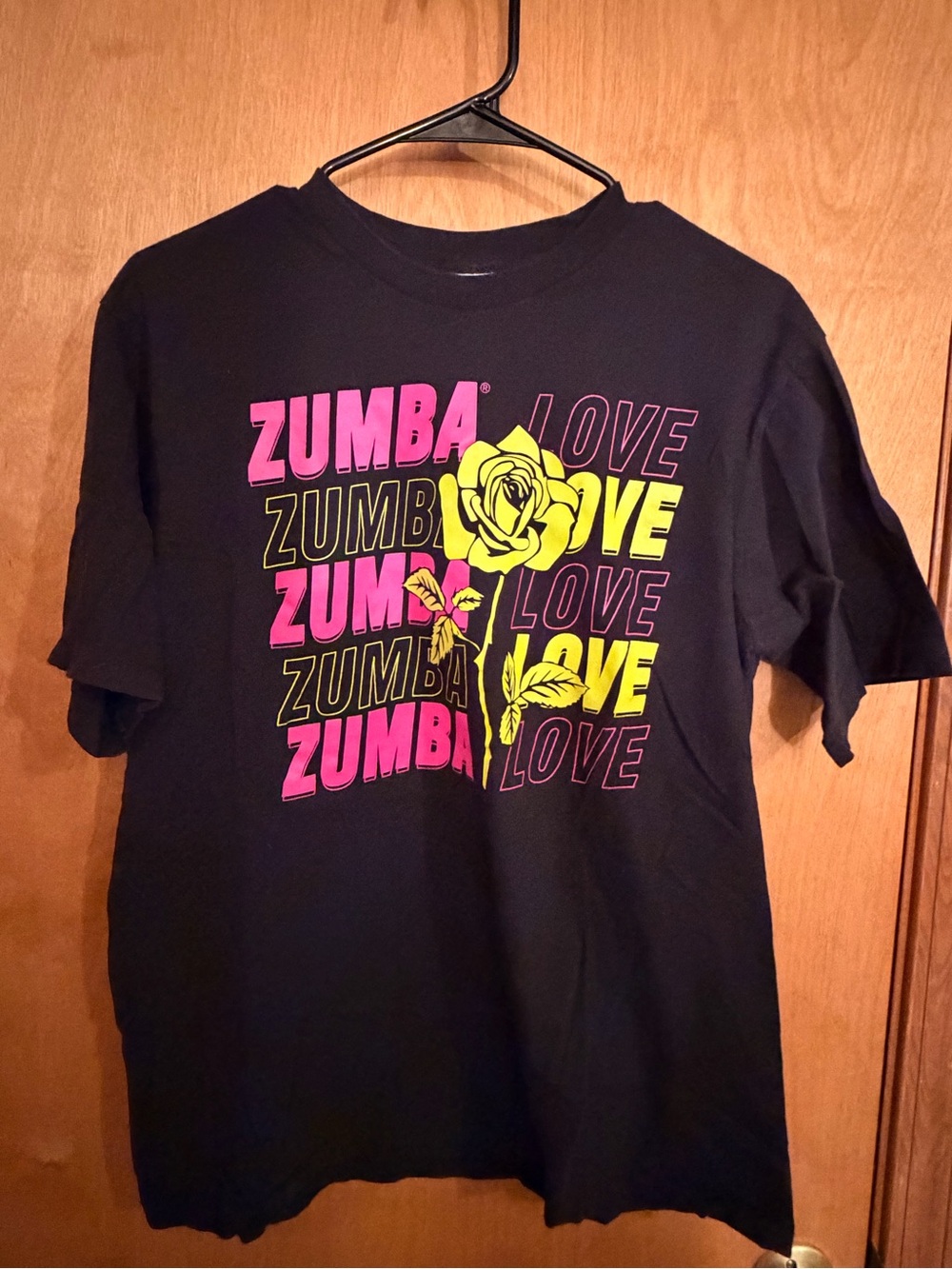 Zumba Fitness Black Tee with Light Blue Tag and Gray Print